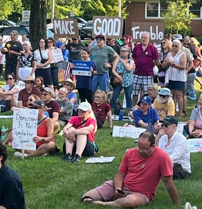 In the Name of John Lewis, Crowd Mobilizes to Oppose Trump, Kean, Jr.